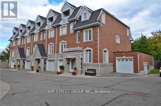Townhouse at 9 STRAWFLOWER MEWS, Toronto