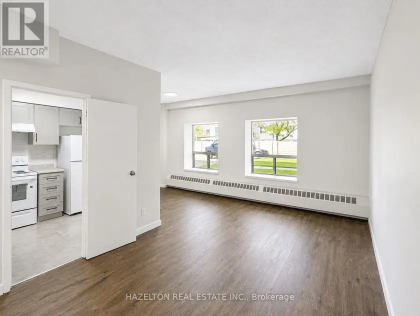 Apartment at 102 - 57 PARKWOODS VILLAGE DRIVE, Toronto