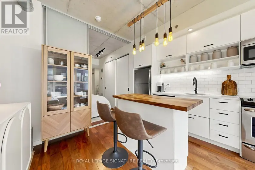 Apartment at 414 - 32 TROLLEY CRESCENT, Toronto