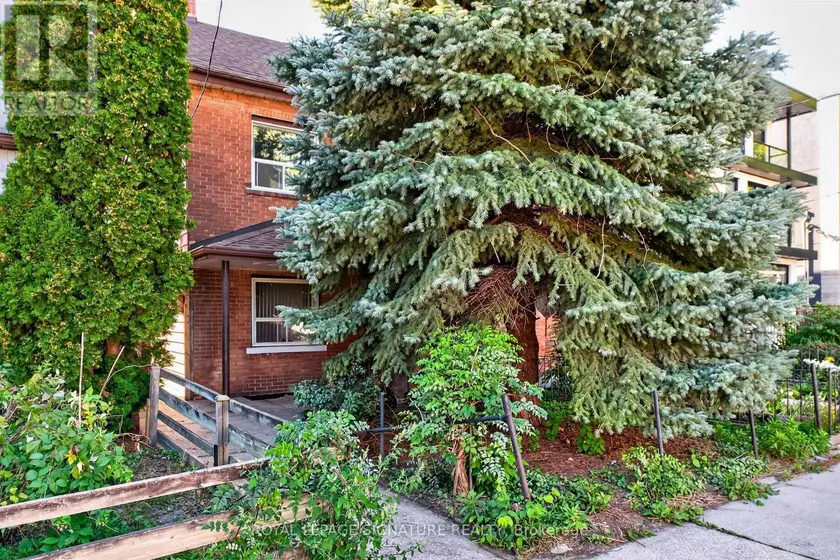 Semi-Detached/Link at 212 LIPPINCOTT STREET, Toronto