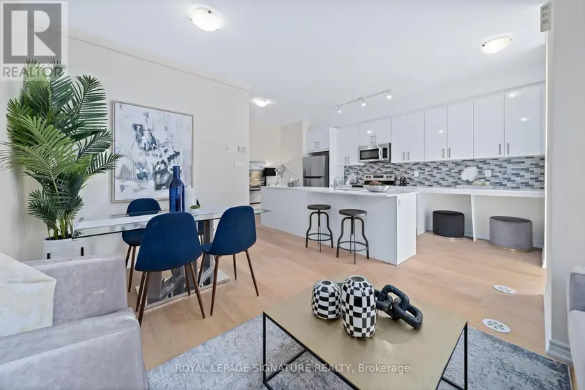 Townhouse at 42 - 30 CURLEW DRIVE, Toronto