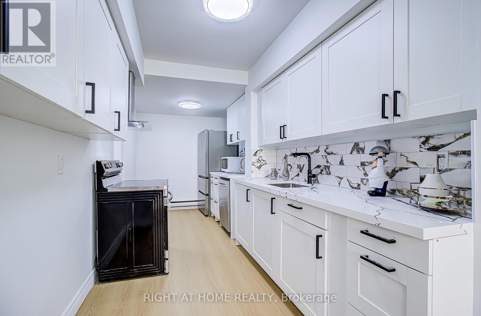 Townhouse at 409 - 8 CRESCENT TOWN ROAD, Toronto