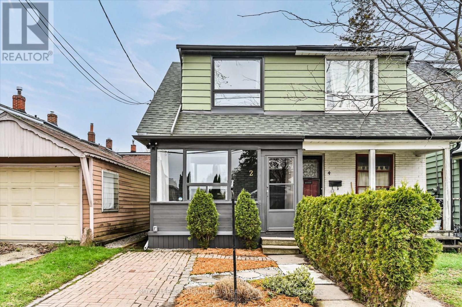 Semi-Detached/Link at 2 NEWMAN AVENUE, Toronto (Crescent Town)