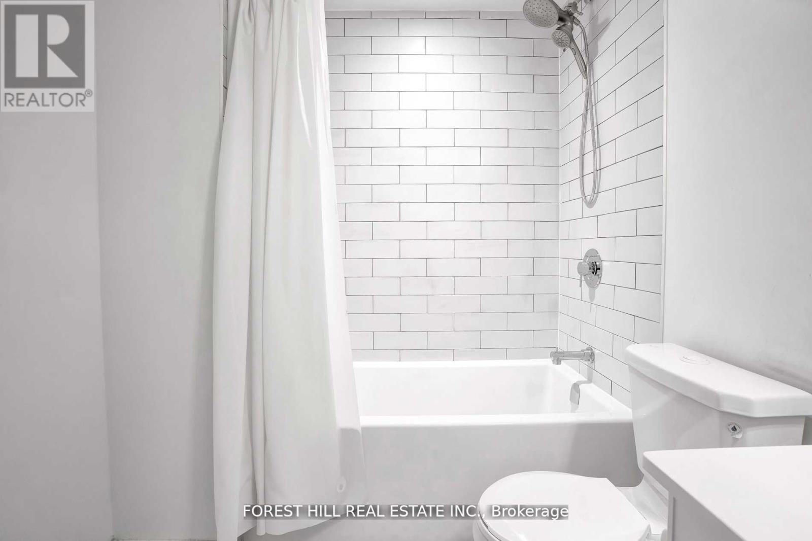 Apartment at 202 - 899 QUEEN STREET E, Toronto