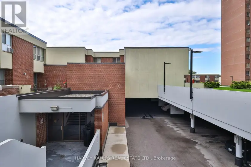 Townhouse at 301 - 10 CRESCENT TOWN ROAD, Toronto