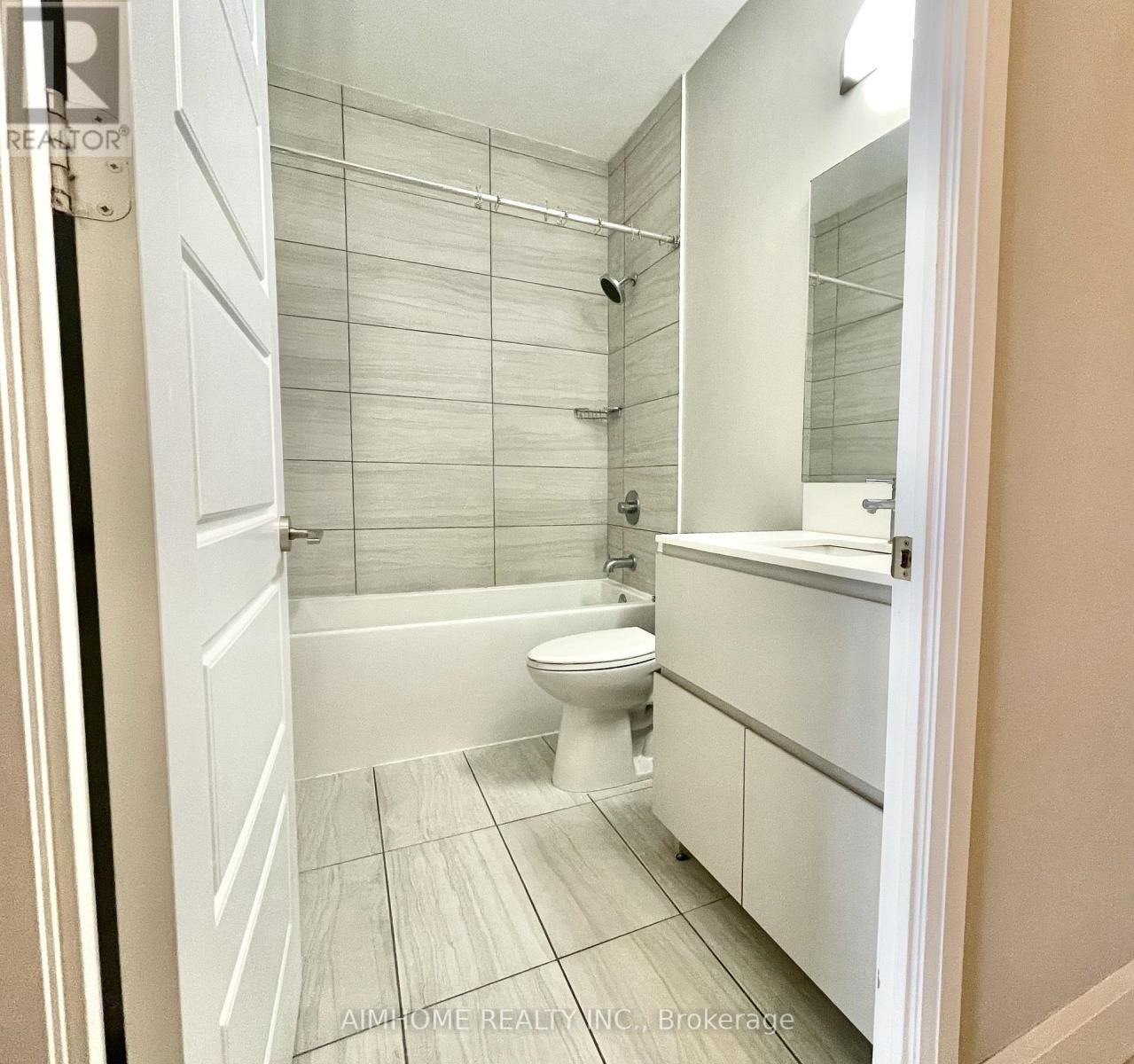 Apartment at 202 - 25 WATER WALK DRIVE, Markham
