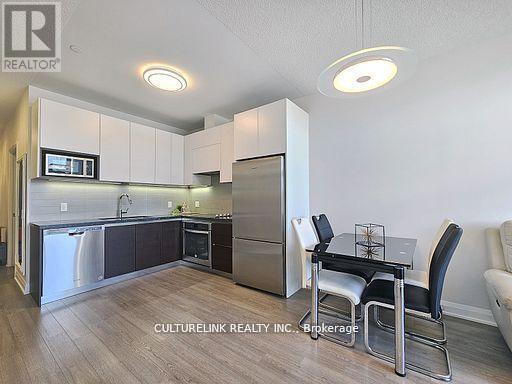 Apartment at 215 - 15 WATER WALK DRIVE, Markham