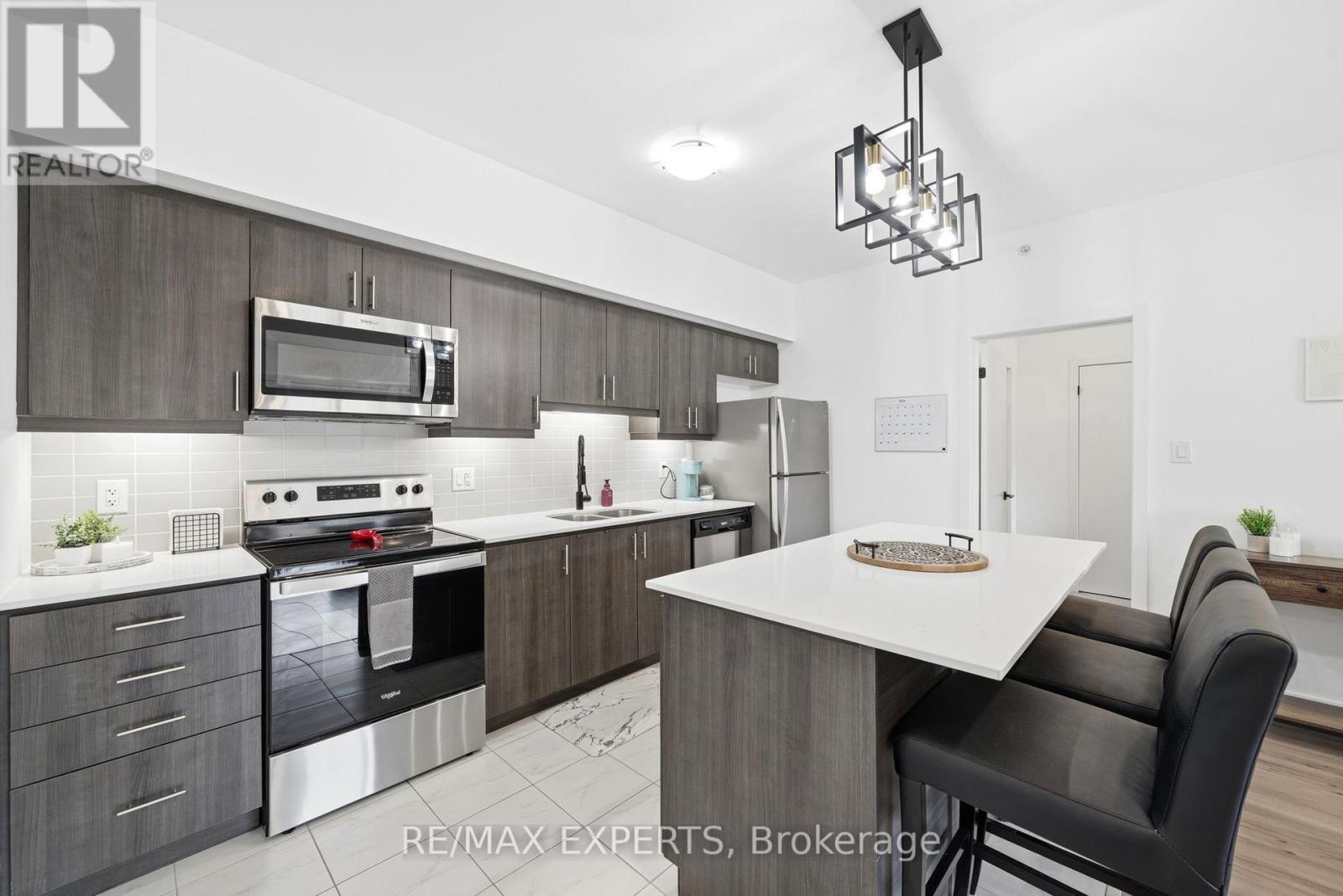 Apartment at 103 - 4 SPICE WAY, Barrie