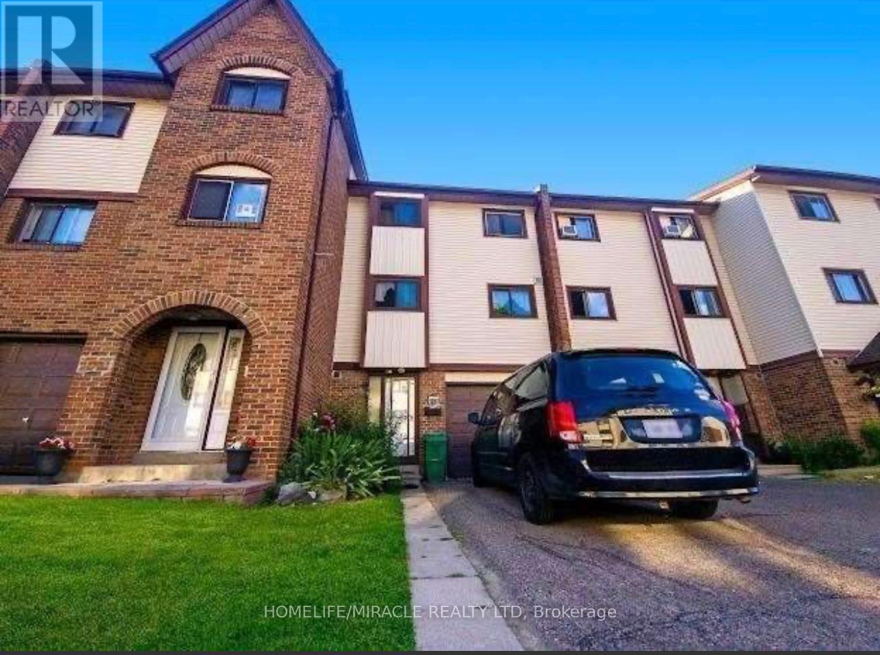 Townhouse at 23 MCCALLUM COURT, Brampton (Queen Street Corridor)