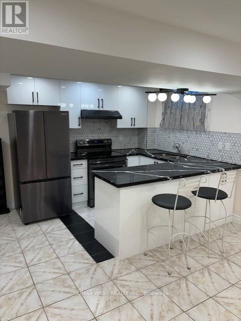 Townhouse at BSMT - 77 NORMAN WESLEY WAY, Toronto (Downsview-Roding-CFB)