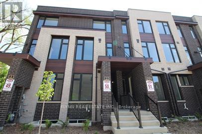 Townhouse at 1 - 33 CREEKBANK ROAD, Toronto (Rustic)