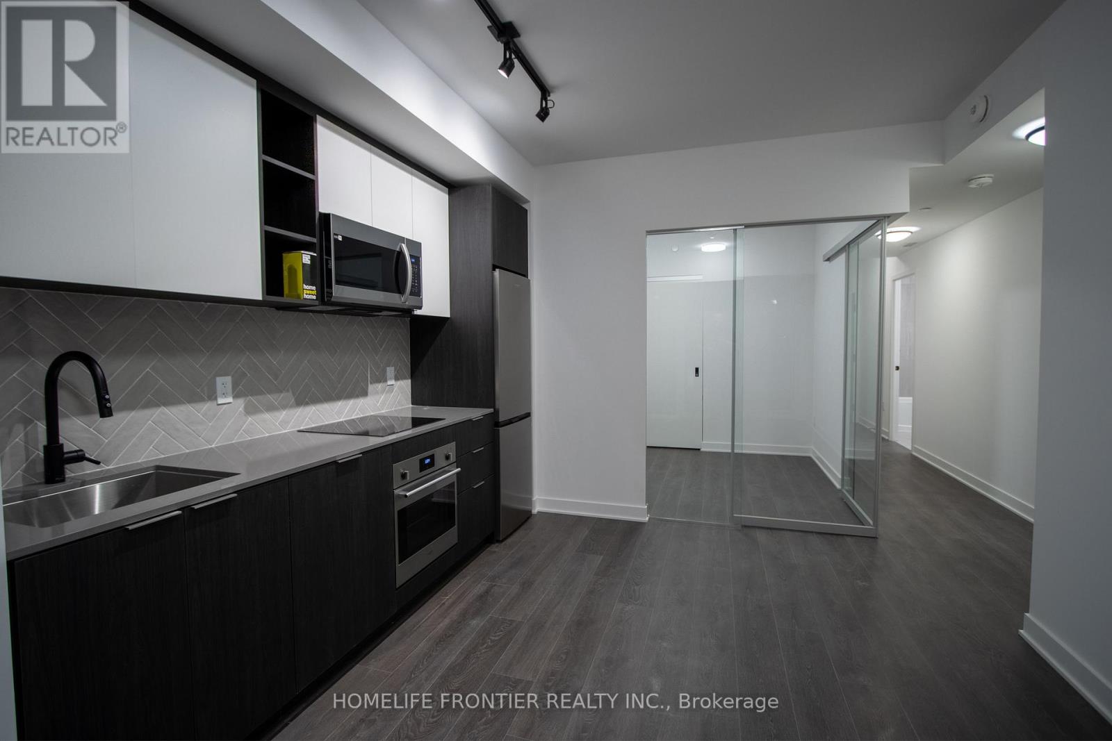 Apartment at 211 - 36 ZORRA STREET, Toronto