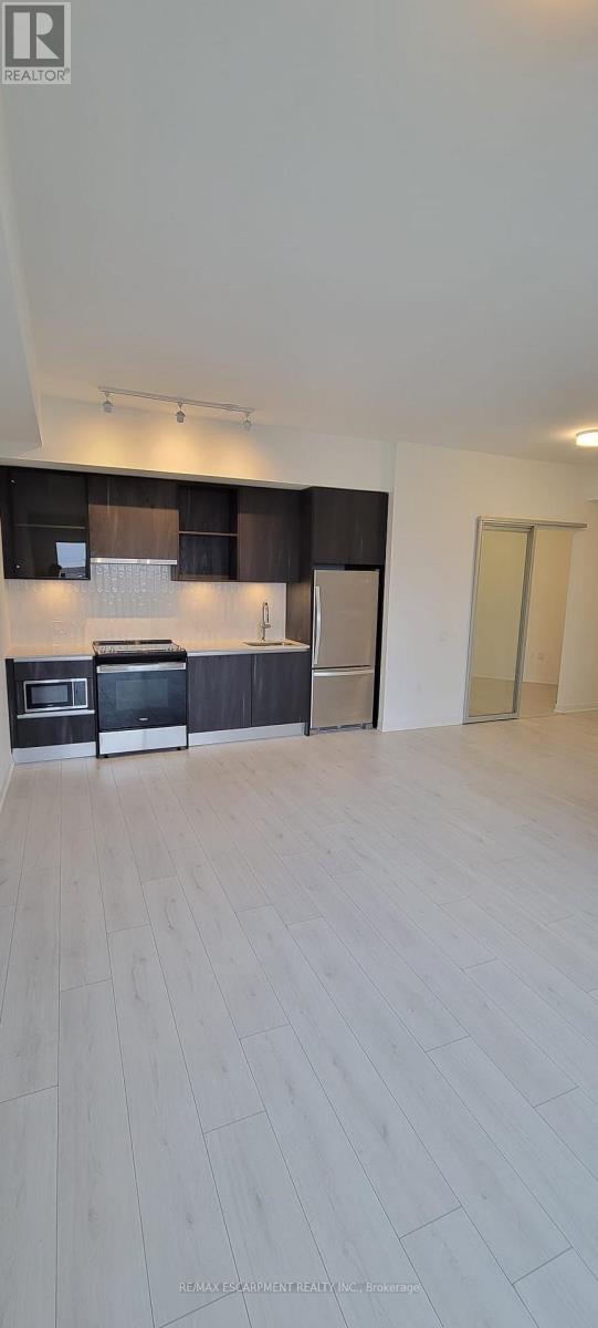 Apartment at 734 - 395 DUNDAS STREET W, Oakville