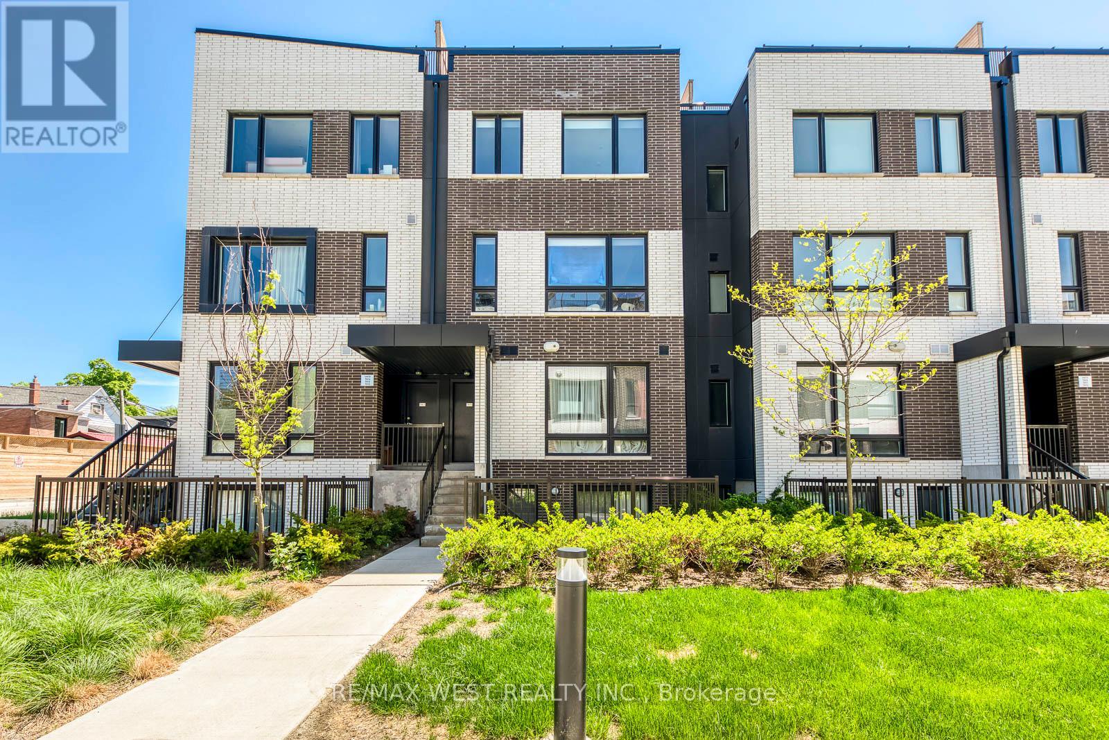 Townhouse at 14 - 30 ED CLARK GARDENS BOULEVARD, Toronto
