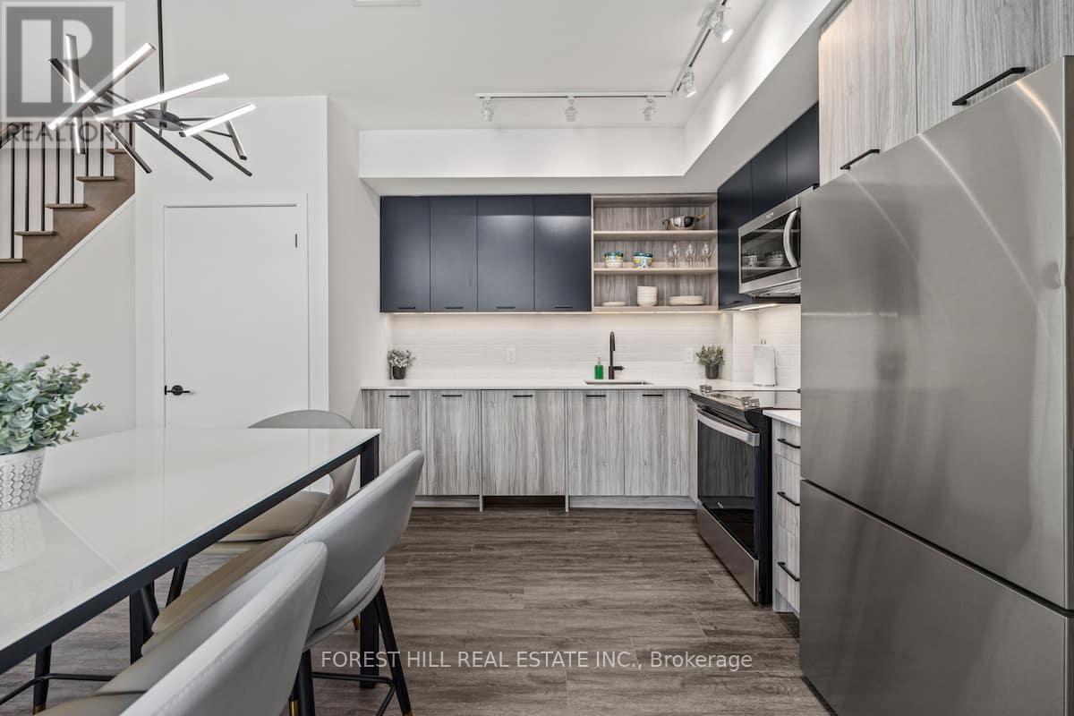 Townhouse at 103 - 2300 ST CLAIR AVENUE W, Toronto