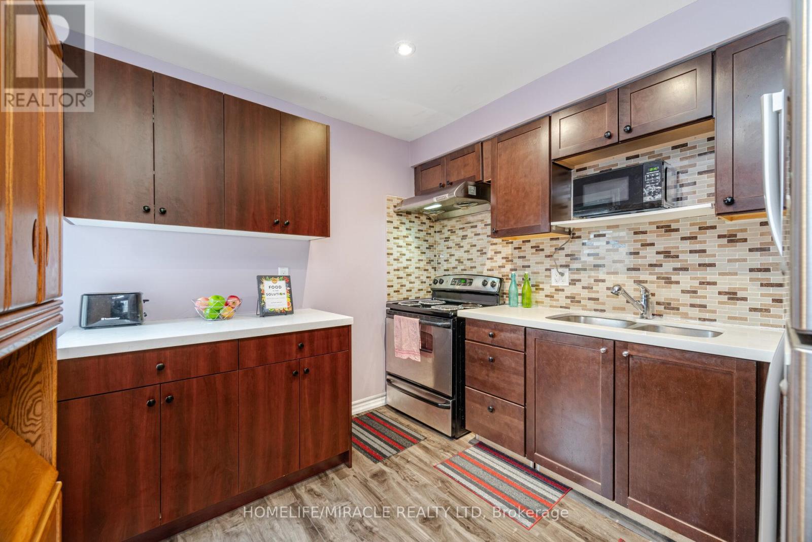 Townhouse at 62 ELMVALE AVENUE, Brampton