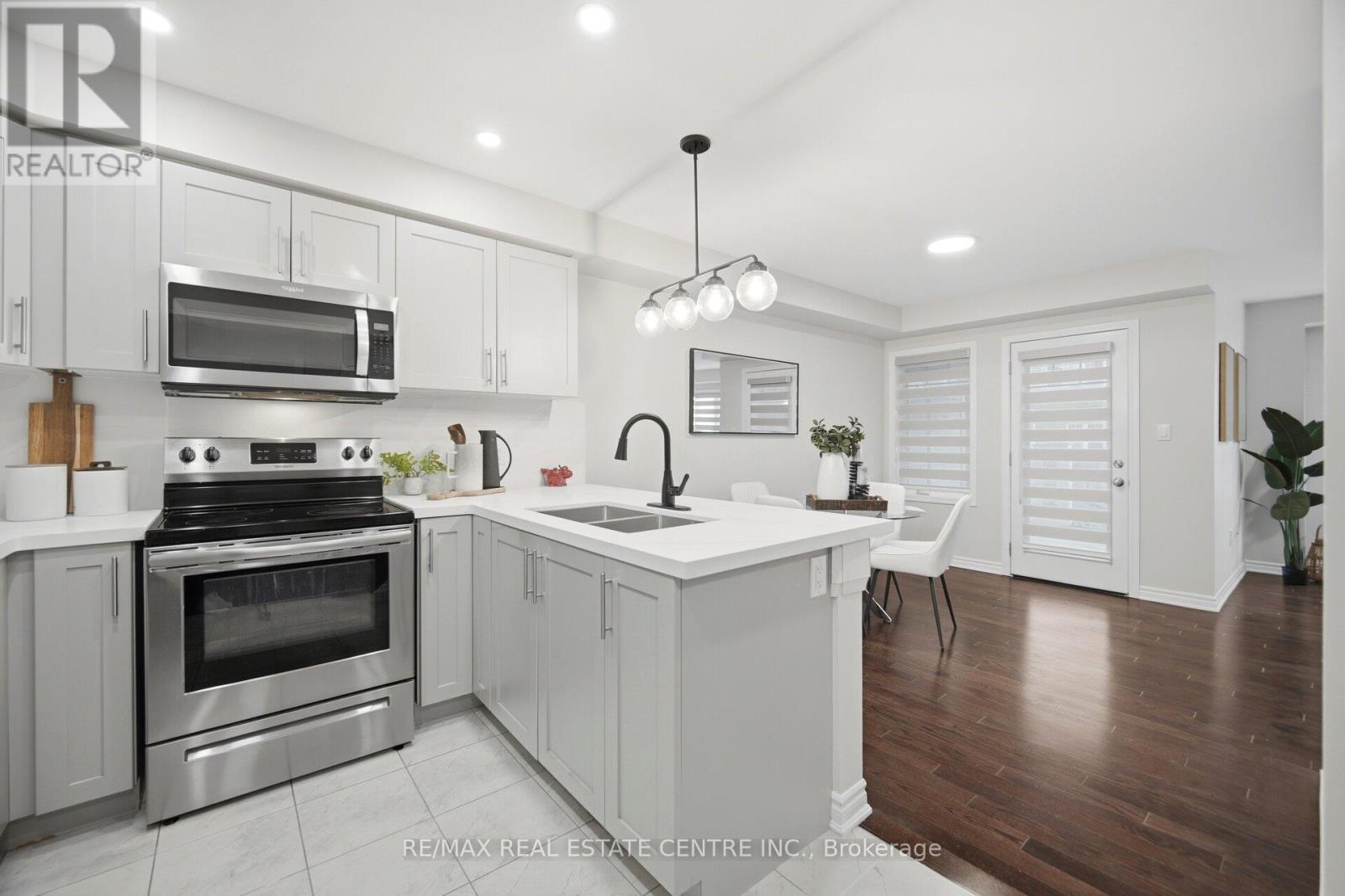 Townhouse at 57 - 1000 ASLETON BOULEVARD, Milton