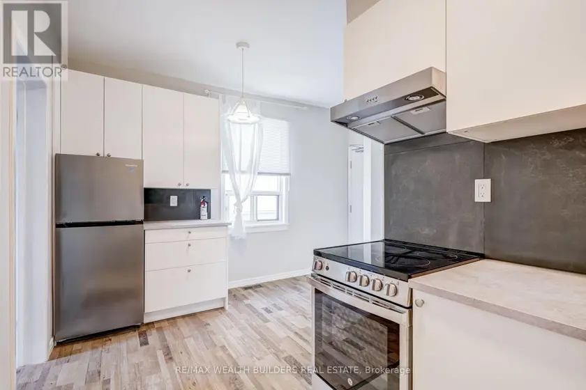 Semi-Detached/Link at UPPER UNIT 2 - 2443 DUNDAS STREET W, Toronto