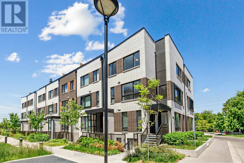 Townhouse at 2 - 40 ED CLARK GARDENS, Toronto