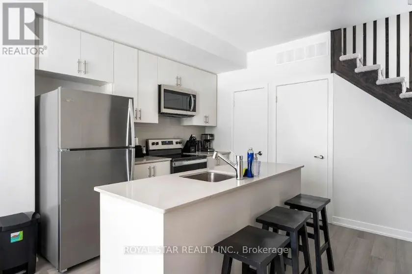 Townhouse at 202 - 3562 CONOLIAL DRIVE, Mississauga