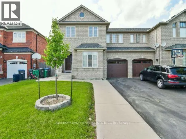 Semi-Detached/Link at 22 STREAMSIDE LANE, Brampton