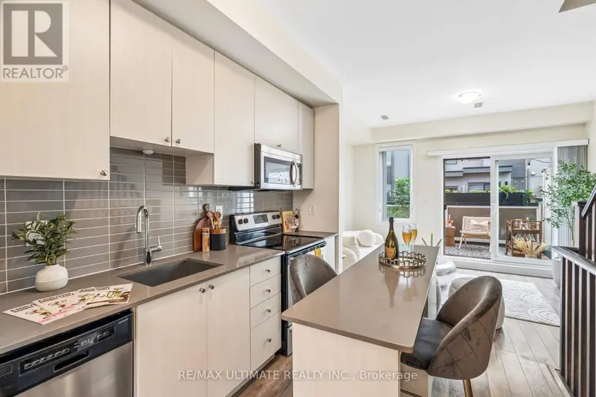 Townhouse at 4 - 45 THOMAS MULHOLLAND DRIVE, Toronto