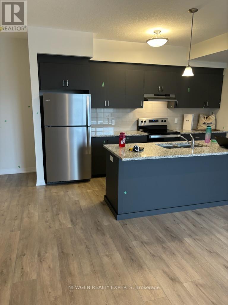Townhouse at E018 - 261 WOODBINE AVE AVENUE, Kitchener