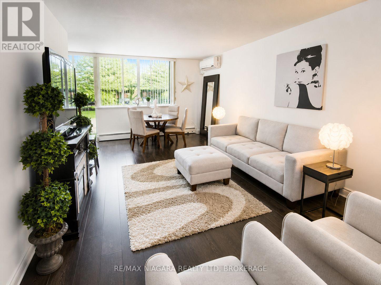 Apartment at 205 - 6390 HUGGINS STREET, Niagara Falls (Stamford)