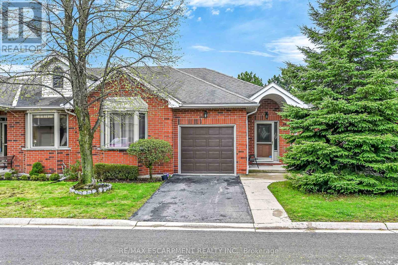 Townhouse at 59 RIVEROAKS DRIVE, Hamilton (Twenty Place)