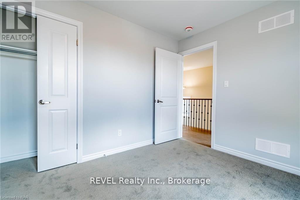 Townhouse at UPPER - 77 RENFREW TRAIL, Welland