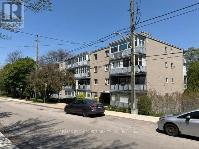 Apartment at 404 - 107 ST. JOSEPH'S DRIVE, Hamilton (Corktown)