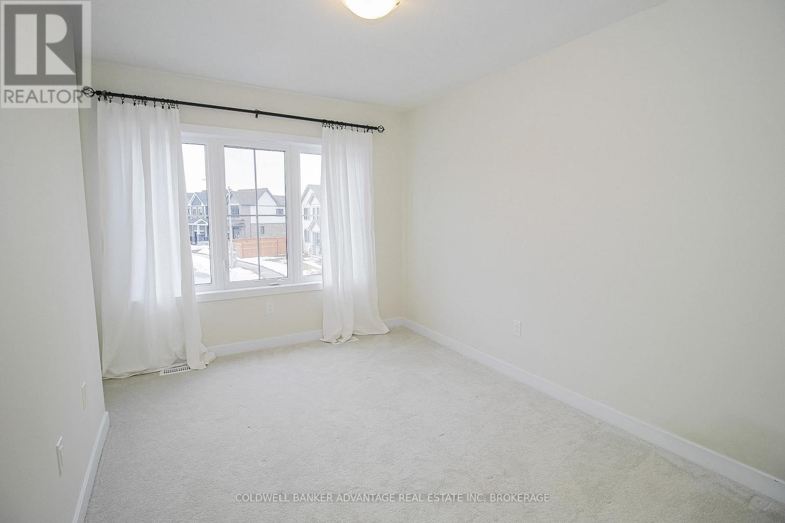Townhouse at 77 KEELSON STREET, Welland