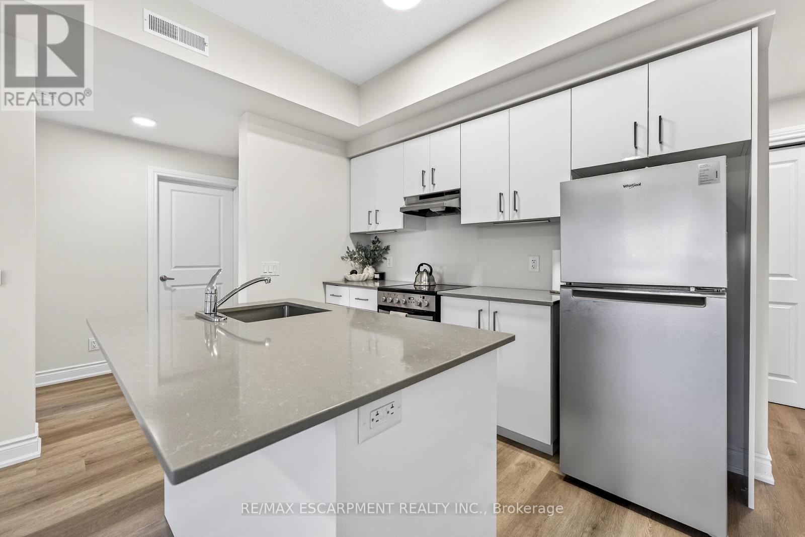 Apartment at 302 - 261 KING STREET E, Hamilton