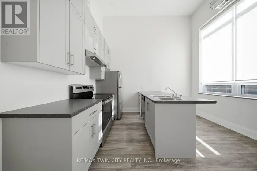 Townhouse at 303 - 11 QUEEN STREET, Brantford