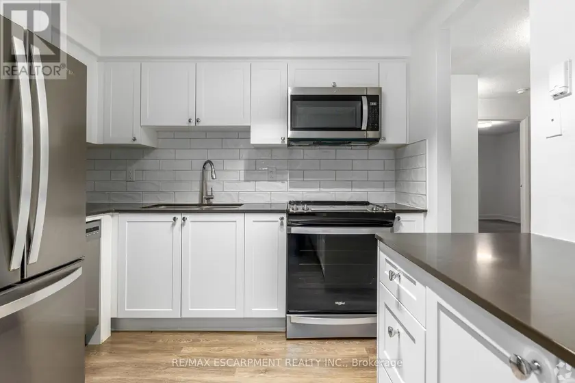 Multiplex at 0033 - 565 BELMONT AVENUE W, Kitchener